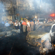 Either a car bomb killed people or a car hit a roadside bomb, killing people.